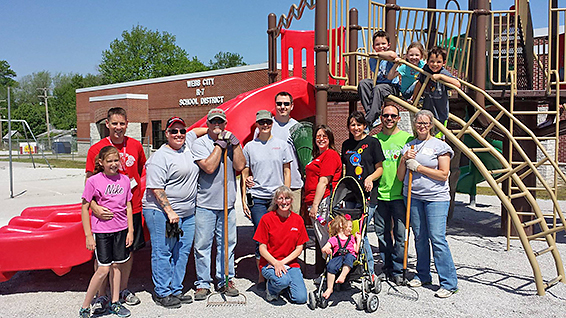 Cardinal Scale employees working at local schools on a Saturday.